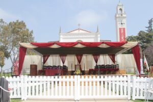 Stage With Satin Bunting, Pole Drapes and Backdrop