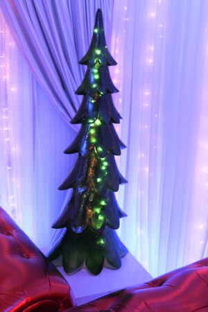 Alpine Christmas tree illuminated